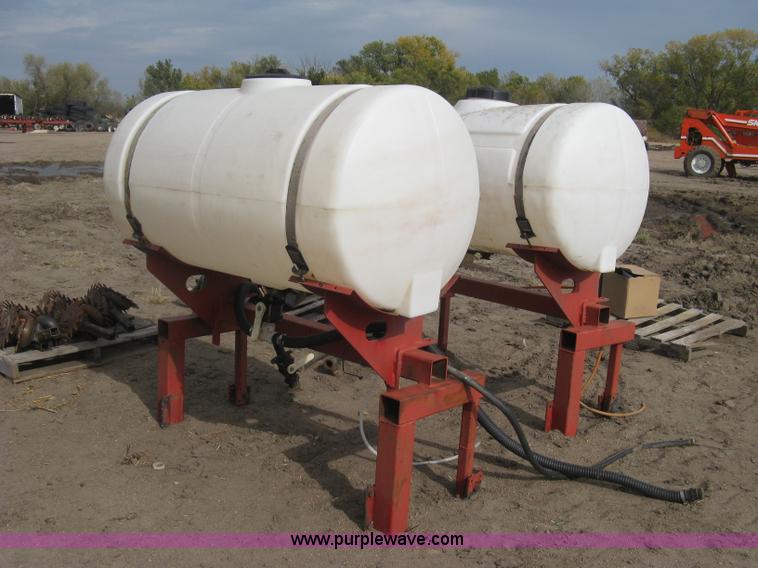image for item H9417 (2) 200 gallon poly saddles tanks