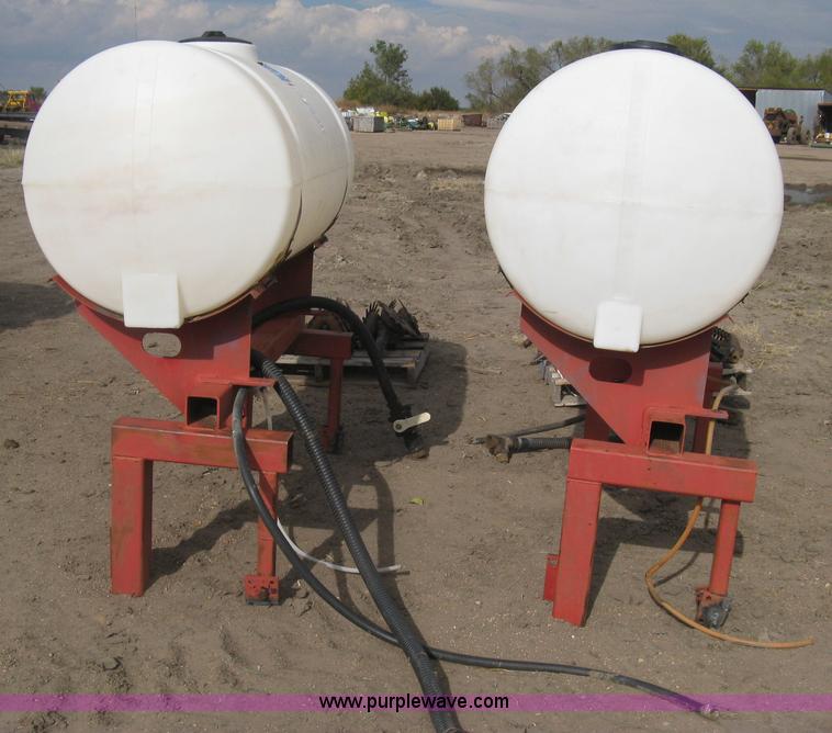 image for item H9417 (2) 200 gallon poly saddles tanks