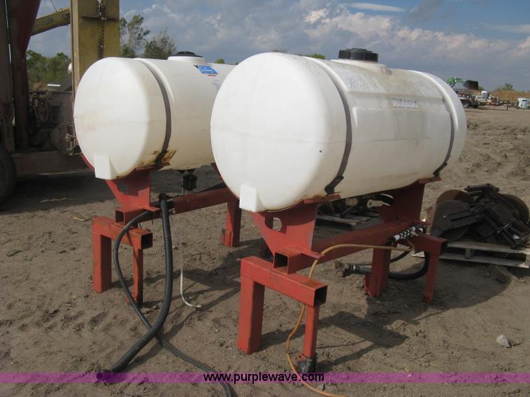 image for item H9417 (2) 200 gallon poly saddles tanks