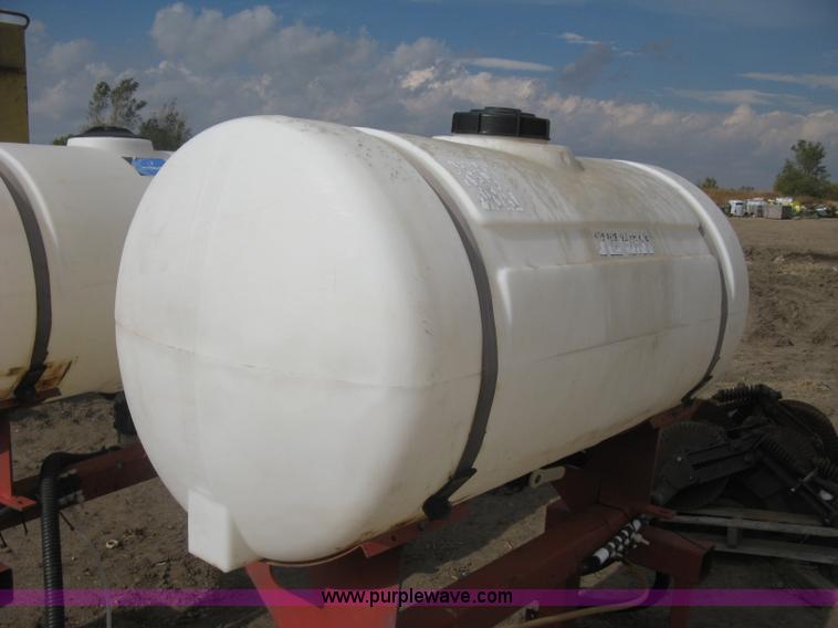 image for item H9417 (2) 200 gallon poly saddles tanks