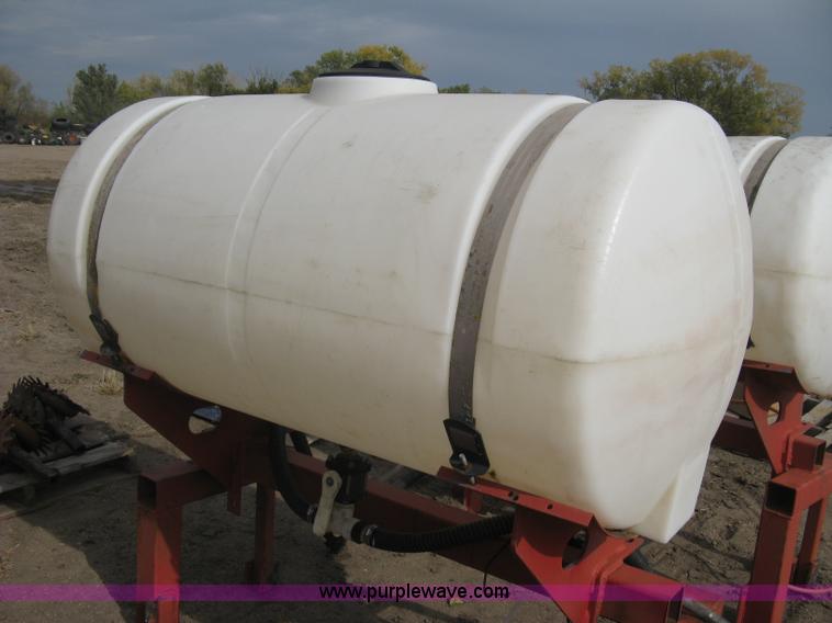 image for item H9417 (2) 200 gallon poly saddles tanks