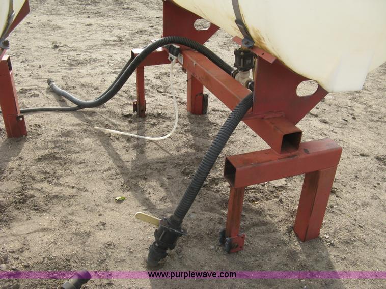 image for item H9417 (2) 200 gallon poly saddles tanks
