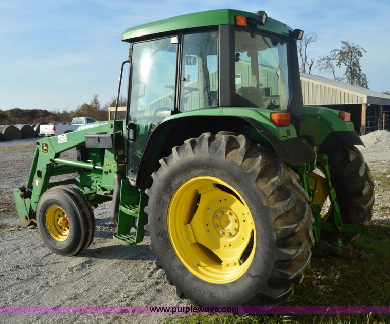 image for item I2944 2001 John Deere 6310 tractor