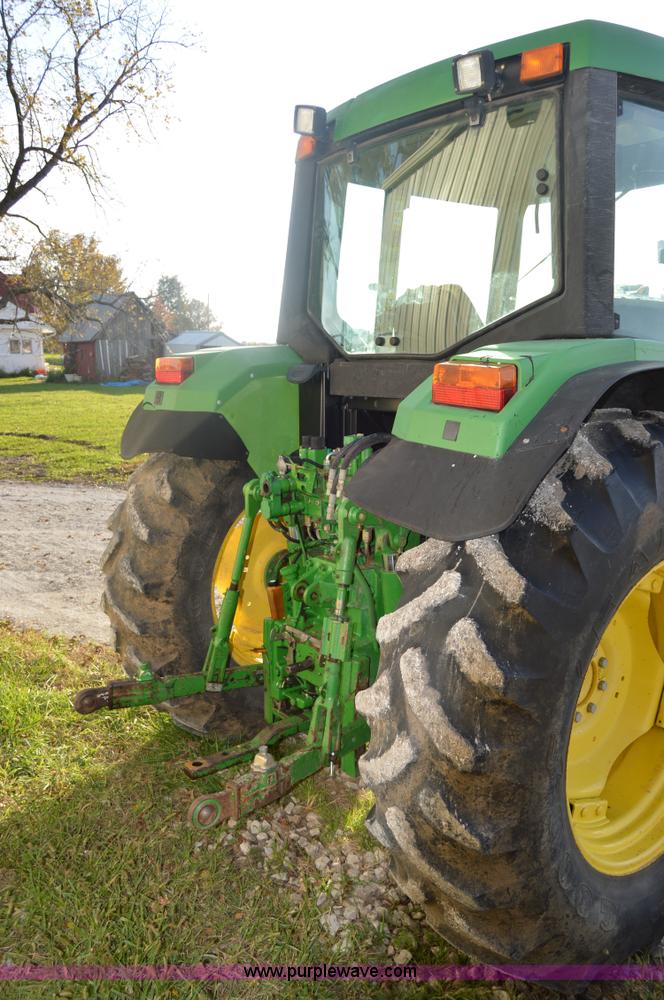 image for item I2944 2001 John Deere 6310 tractor