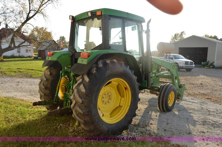 image for item I2944 2001 John Deere 6310 tractor