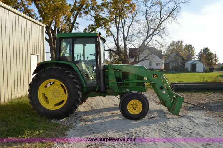 image for item I2944 2001 John Deere 6310 tractor