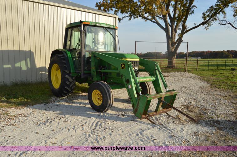 image for item I2944 2001 John Deere 6310 tractor