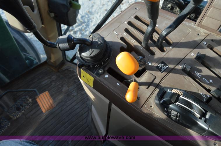 image for item I2944 2001 John Deere 6310 tractor