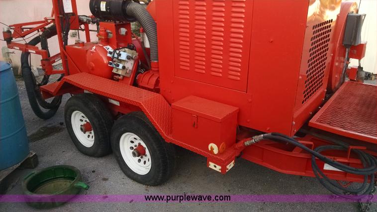 image for item AY9486 2008 Crafco Magnum spray injection patcher