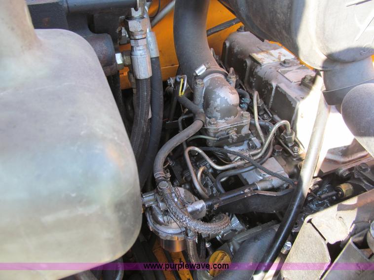 image for item E4999 2001 Mustang 2050 skid steer