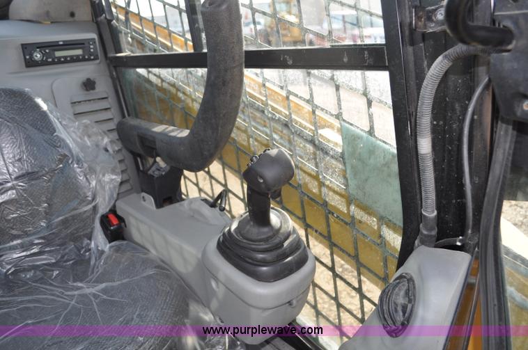 image for item F2099 2013 Caterpillar 246C skid steer