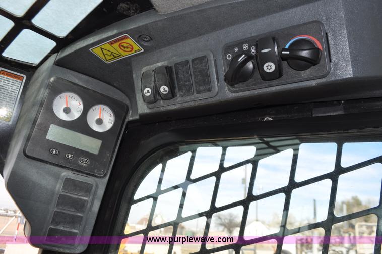 image for item F2099 2013 Caterpillar 246C skid steer