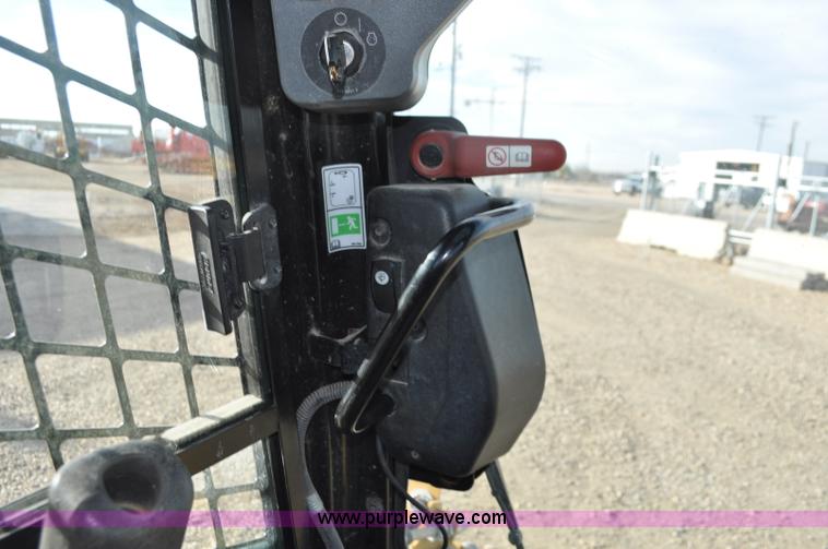 image for item F2099 2013 Caterpillar 246C skid steer