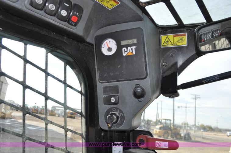 image for item F2099 2013 Caterpillar 246C skid steer