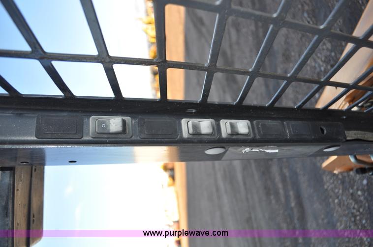 image for item F2106 2003 Case 70XT skid steer