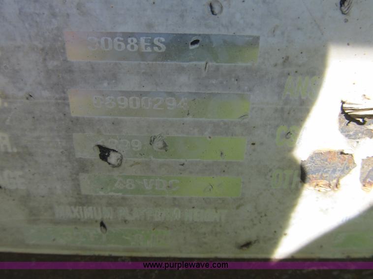 image for item G6507 1999 Mec 3068ES scissor lift