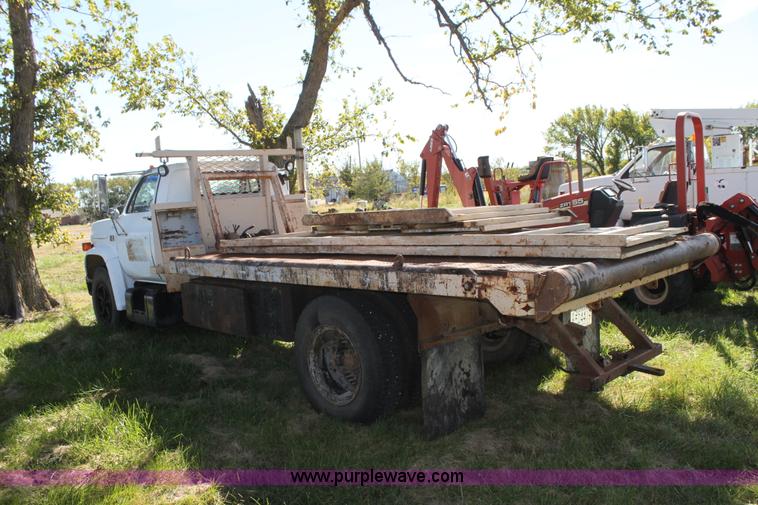 image for item H8816 1985 GMC TopKick 7000 winch truck