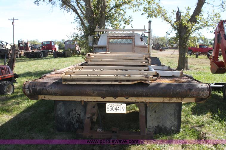 image for item H8816 1985 GMC TopKick 7000 winch truck