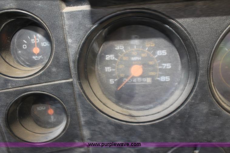 image for item H8816 1985 GMC TopKick 7000 winch truck