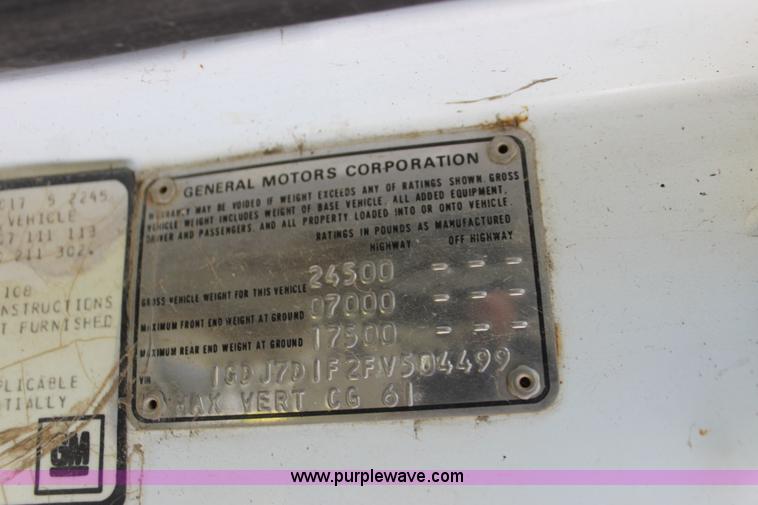 image for item H8816 1985 GMC TopKick 7000 winch truck