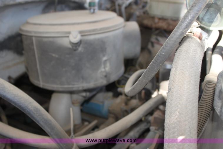 image for item H8816 1985 GMC TopKick 7000 winch truck