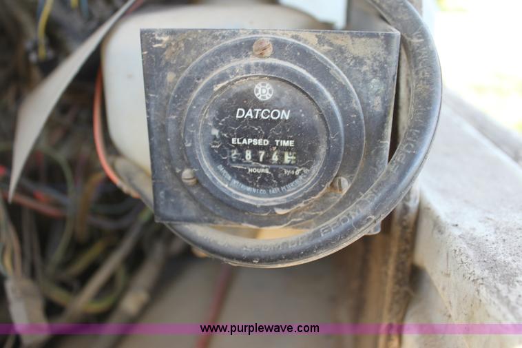 image for item H8816 1985 GMC TopKick 7000 winch truck