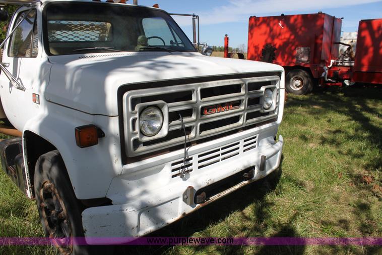 image for item H8816 1985 GMC TopKick 7000 winch truck