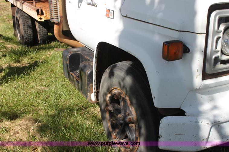 image for item H8816 1985 GMC TopKick 7000 winch truck