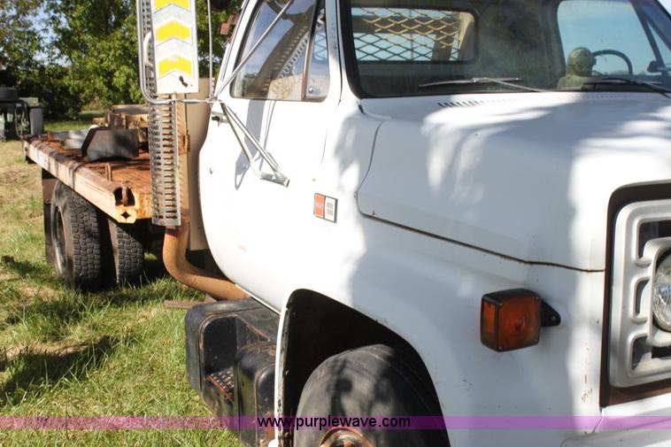 image for item H8816 1985 GMC TopKick 7000 winch truck