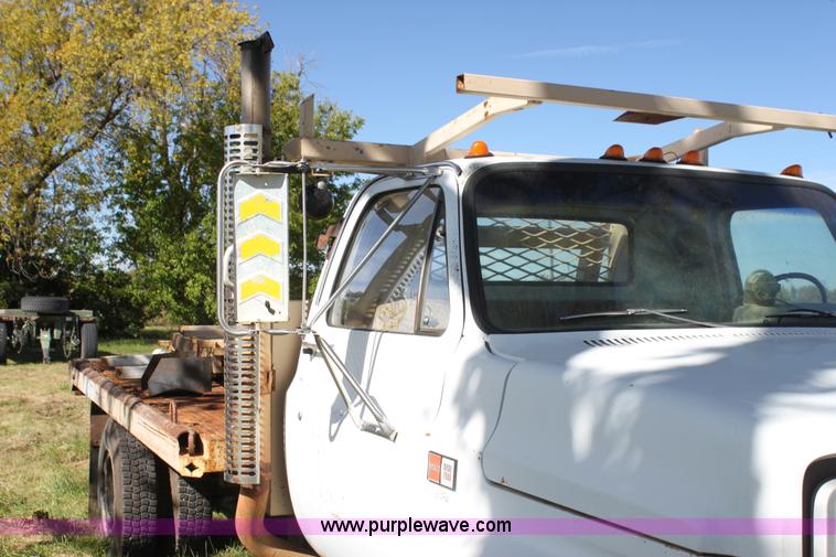 image for item H8816 1985 GMC TopKick 7000 winch truck