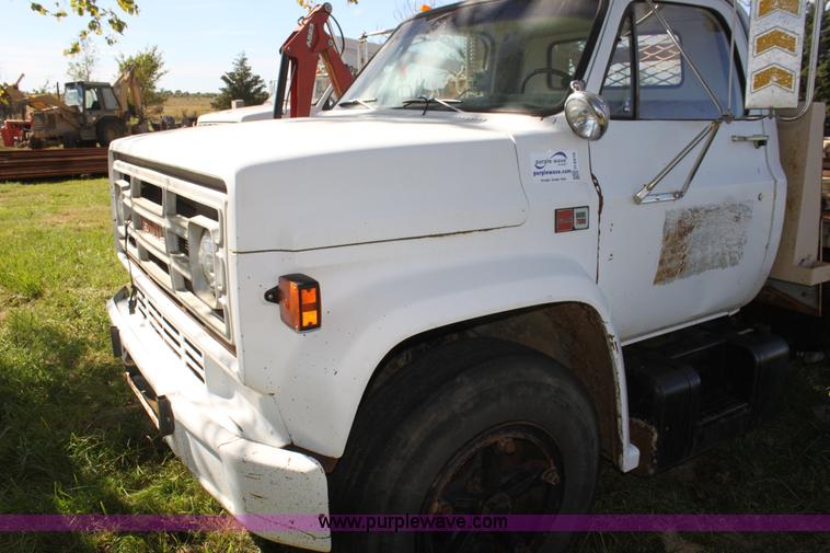 image for item H8816 1985 GMC TopKick 7000 winch truck