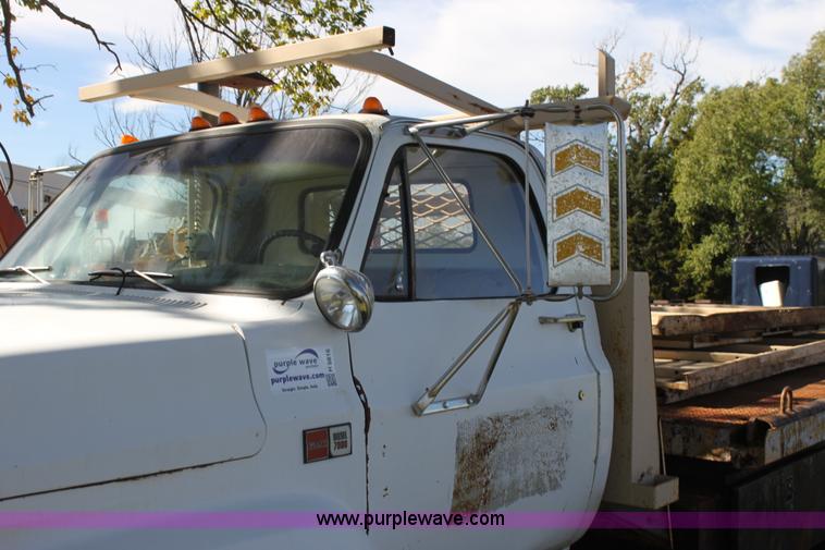 image for item H8816 1985 GMC TopKick 7000 winch truck