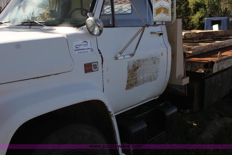 image for item H8816 1985 GMC TopKick 7000 winch truck