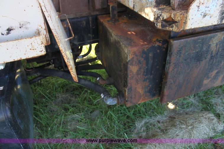 image for item H8816 1985 GMC TopKick 7000 winch truck