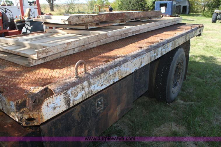 image for item H8816 1985 GMC TopKick 7000 winch truck