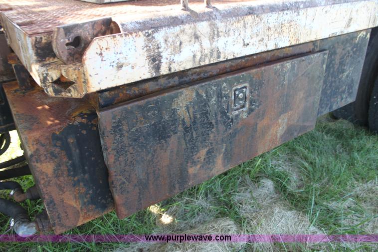 image for item H8816 1985 GMC TopKick 7000 winch truck