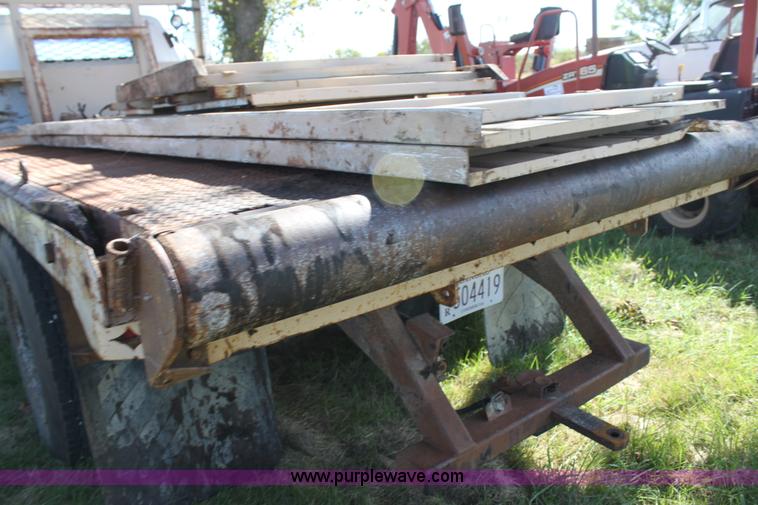 image for item H8816 1985 GMC TopKick 7000 winch truck