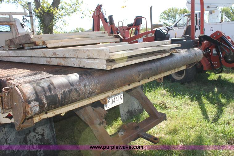 image for item H8816 1985 GMC TopKick 7000 winch truck