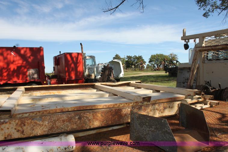 image for item H8816 1985 GMC TopKick 7000 winch truck