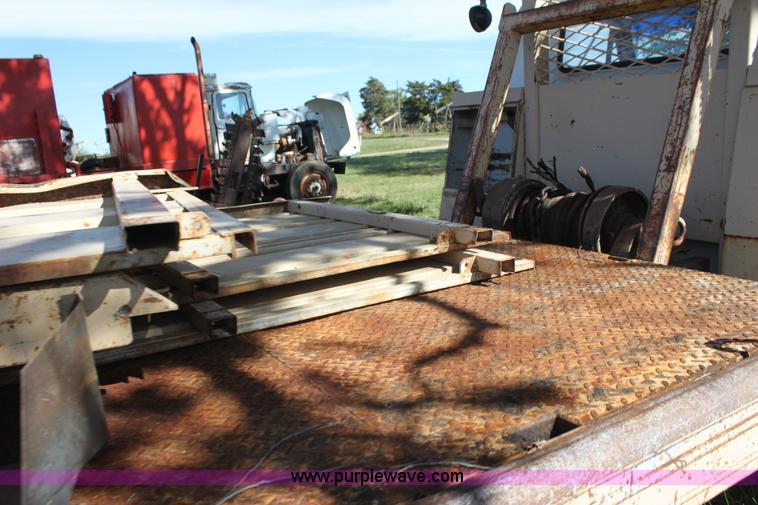 image for item H8816 1985 GMC TopKick 7000 winch truck