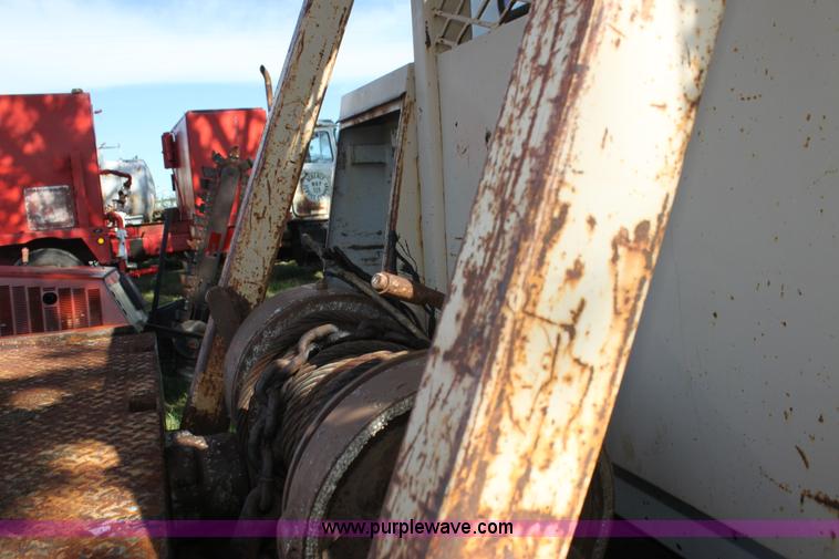 image for item H8816 1985 GMC TopKick 7000 winch truck