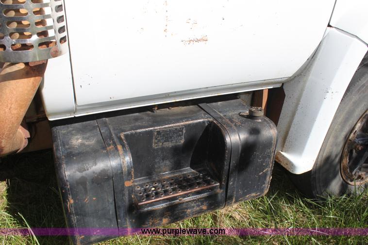 image for item H8816 1985 GMC TopKick 7000 winch truck