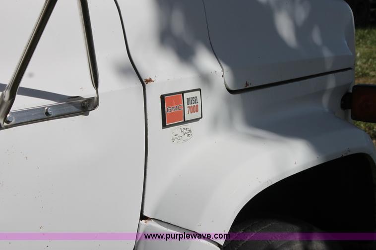 image for item H8816 1985 GMC TopKick 7000 winch truck