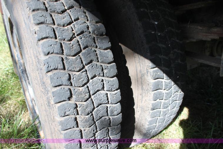 image for item H8816 1985 GMC TopKick 7000 winch truck