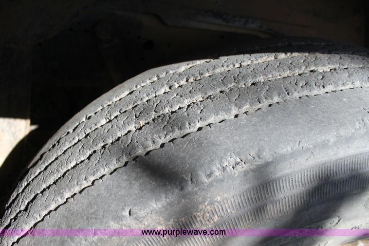 image for item H8816 1985 GMC TopKick 7000 winch truck