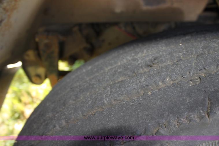 image for item H8816 1985 GMC TopKick 7000 winch truck