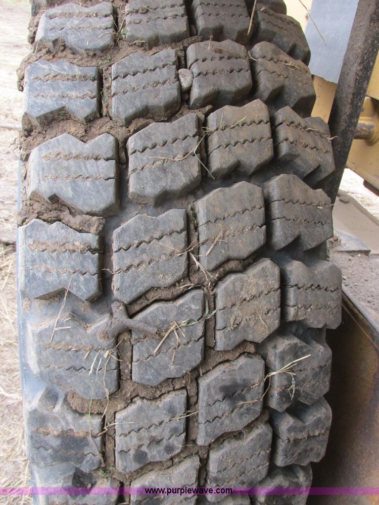 image for item I6038 1987 Caterpillar 140G articulated motor grader