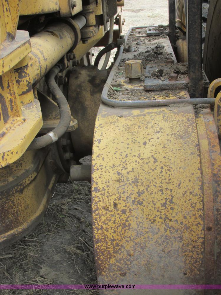 image for item I6038 1987 Caterpillar 140G articulated motor grader