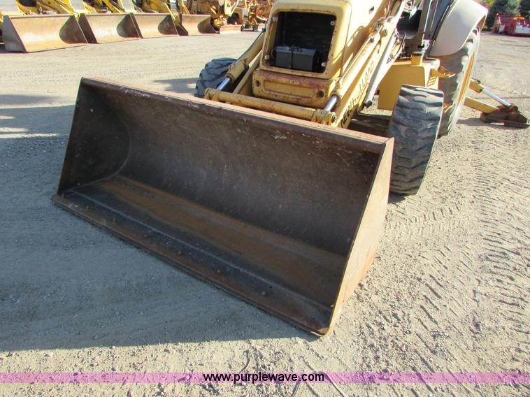 image for item I6737 1998 New Holland 655E backhoe