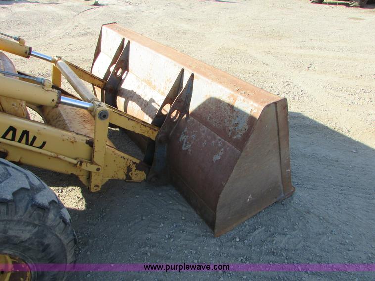 image for item I6737 1998 New Holland 655E backhoe